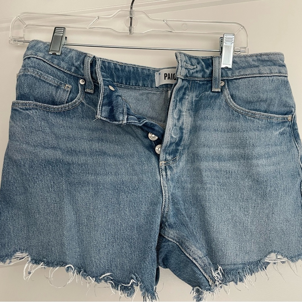 PAIGE Medium Wash Distressed Denim Cutoff Shorts